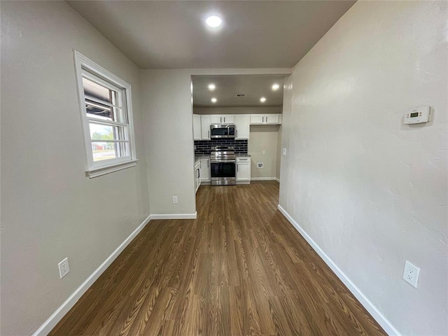 interior space with dark hardwood / wood-style flooring