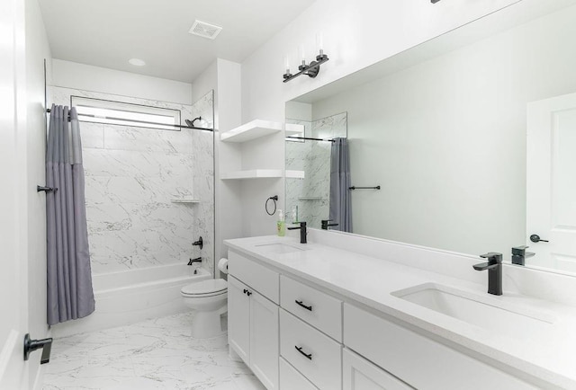 full bathroom with vanity, toilet, and shower / bath combo with shower curtain