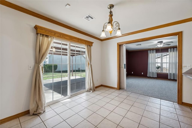 carpeted spare room with ceiling fan with notable chandelier and crown molding