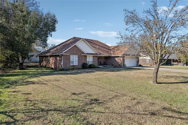 single story home with a garage and a front yard