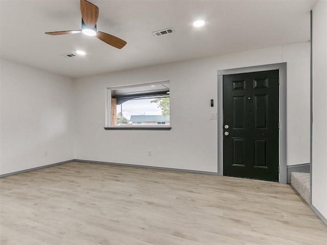 interior space featuring ceiling fan and light hardwood / wood-style flooring