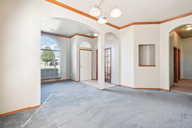 interior space featuring a notable chandelier and crown molding