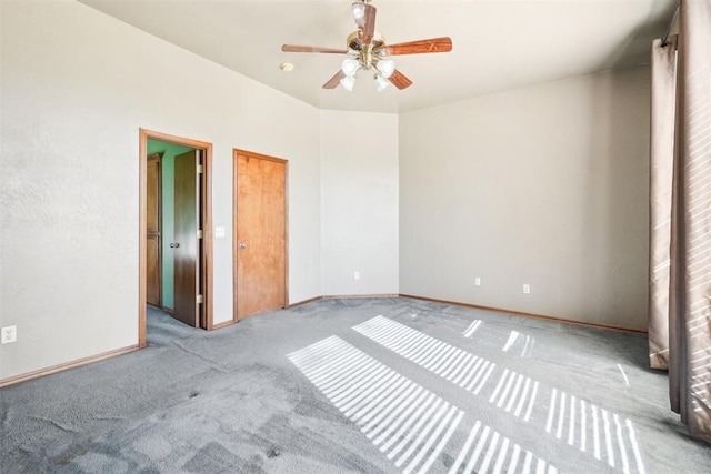 unfurnished bedroom featuring light carpet and ceiling fan