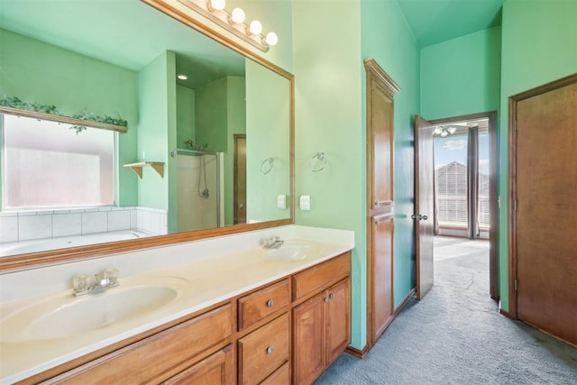 bathroom with vanity and plus walk in shower