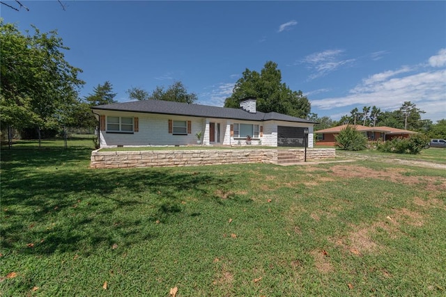 single story home featuring a front yard