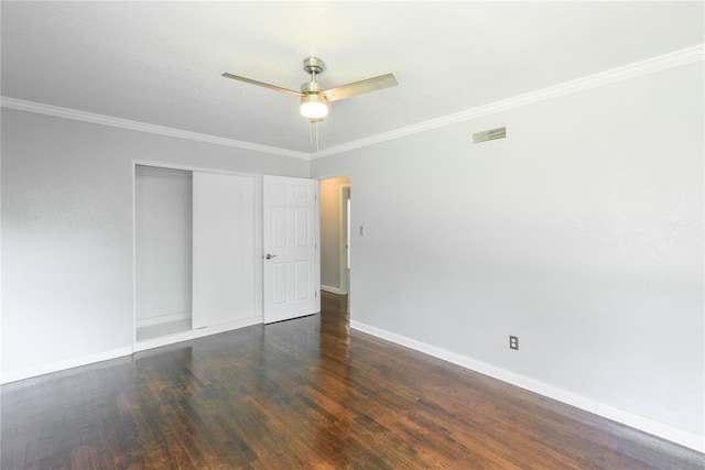 unfurnished room featuring crown molding, ceiling fan, and dark hardwood / wood-style floors