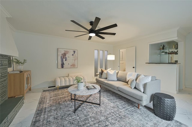 living room featuring ceiling fan and ornamental molding