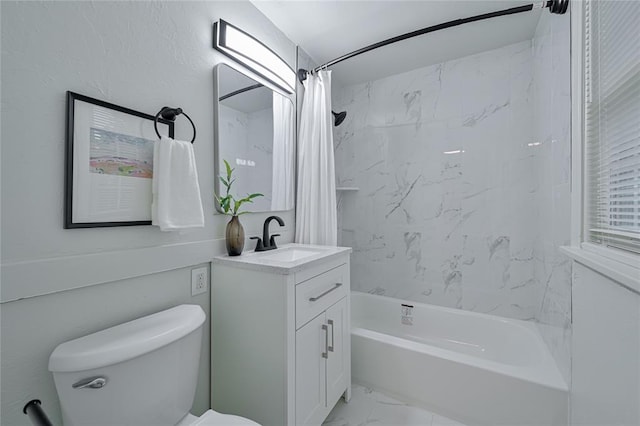 full bathroom featuring shower / tub combo, vanity, and toilet