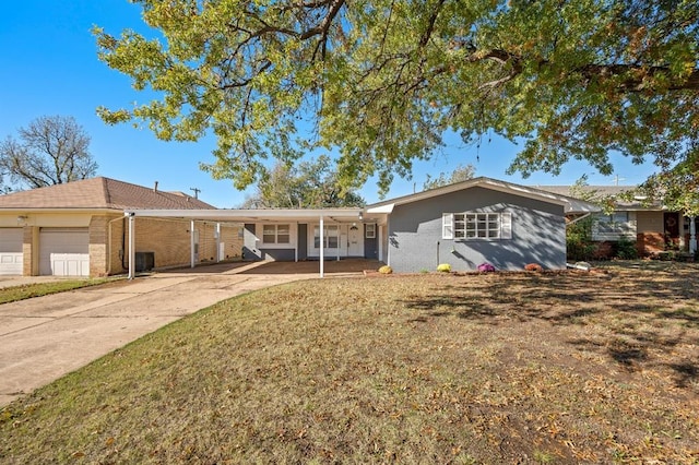 single story home with covered porch, a garage, central air condition unit, and a front yard