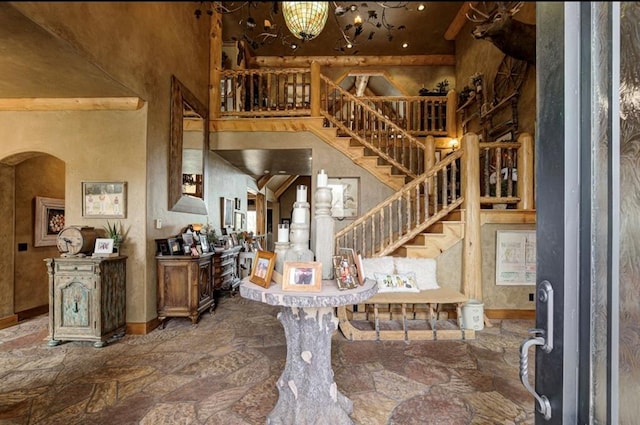 entrance foyer featuring a high ceiling