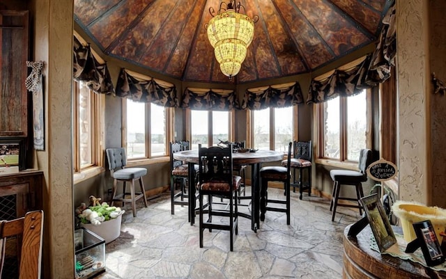 dining area with lofted ceiling