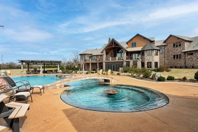 view of pool featuring a patio