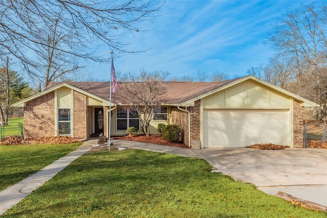 ranch-style home with a garage and a front lawn