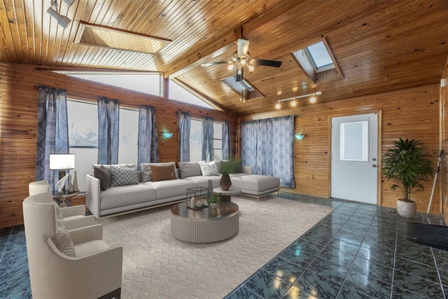 living room featuring wood ceiling, wooden walls, and lofted ceiling with skylight