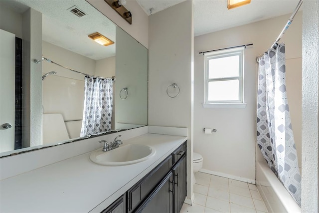 full bathroom with vanity, a textured ceiling, shower / bath combination with curtain, and toilet