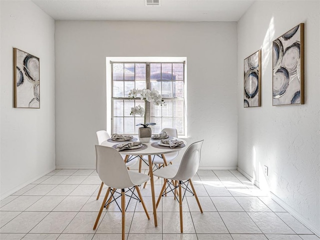 view of tiled dining room