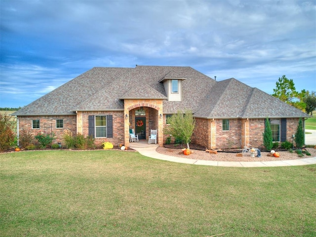 view of front of home with a front yard