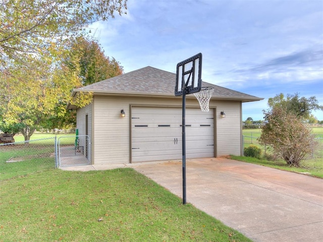 garage with a yard