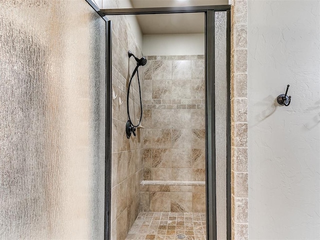 bathroom featuring an enclosed shower