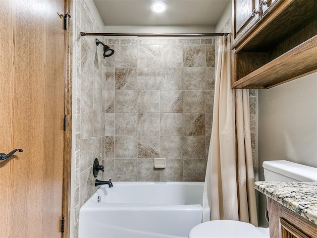 bathroom with vanity and shower / bath combo