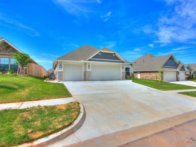 craftsman-style home with a front yard and a garage