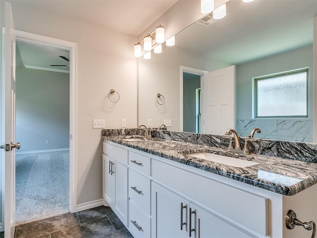 bathroom featuring ceiling fan, tile patterned flooring, and vanity