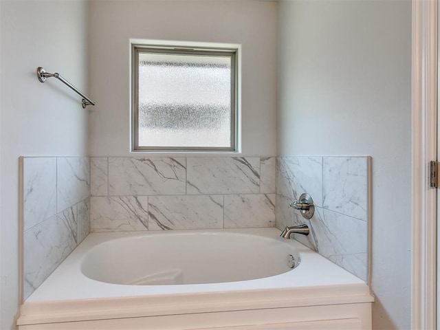 bathroom featuring a tub to relax in