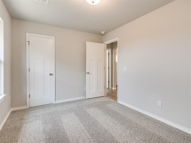 view of carpeted spare room