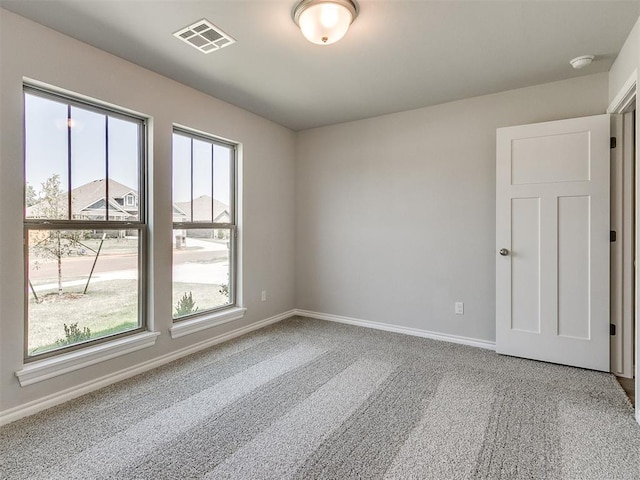 empty room featuring carpet