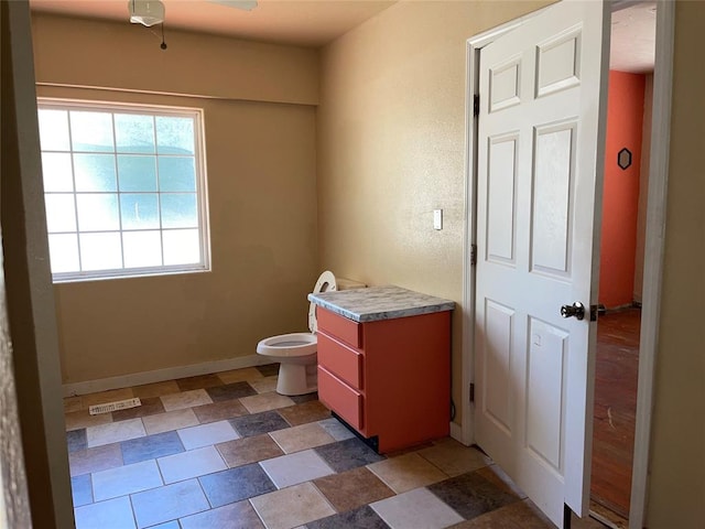 bathroom featuring toilet