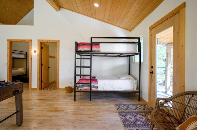 bedroom with light hardwood / wood-style flooring, high vaulted ceiling, wood ceiling, and beamed ceiling