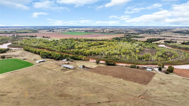 birds eye view of property with a rural view