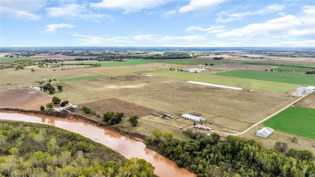 drone / aerial view featuring a water view and a rural view