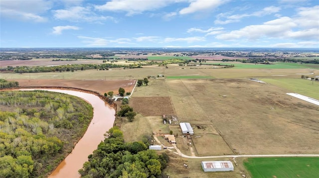 birds eye view of property featuring a rural view