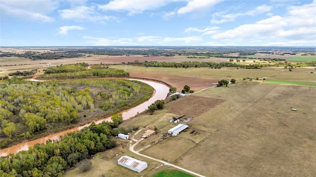 birds eye view of property with a rural view