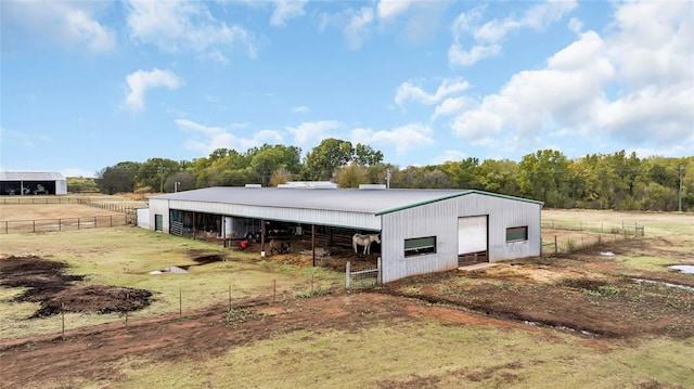 view of outdoor structure featuring a rural view