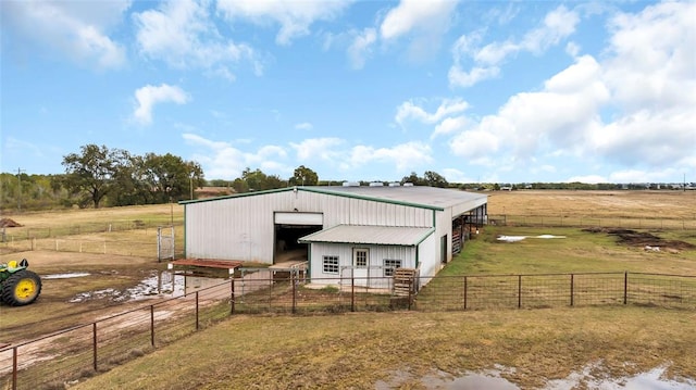 view of outbuilding with a rural view