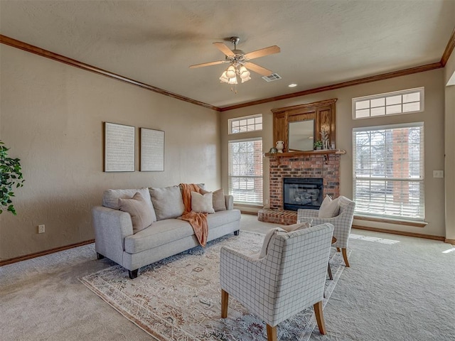 living room with a fireplace, crown molding, plenty of natural light, and light colored carpet