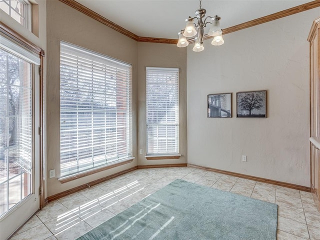 unfurnished dining area featuring ornamental molding, plenty of natural light, light tile patterned flooring, and an inviting chandelier