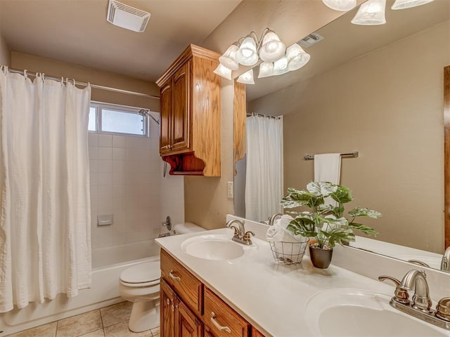 full bathroom with tile patterned flooring, vanity, toilet, and shower / bath combo