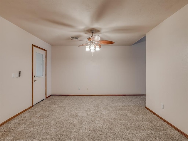 carpeted empty room with ceiling fan