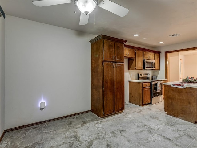 kitchen with stainless steel appliances and ceiling fan