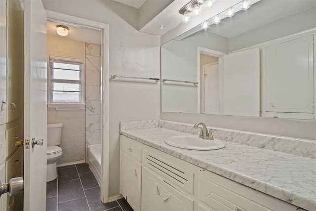 full bathroom featuring shower / bathing tub combination, tile patterned flooring, vanity, and toilet