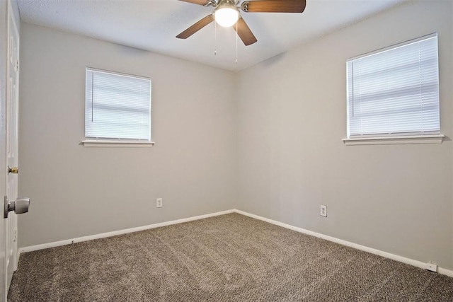 spare room with carpet flooring and ceiling fan