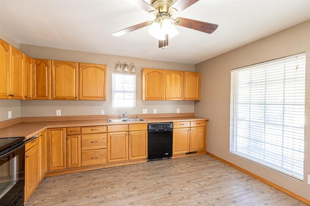 kitchen with ceiling fan, sink, black appliances, and light hardwood / wood-style floors