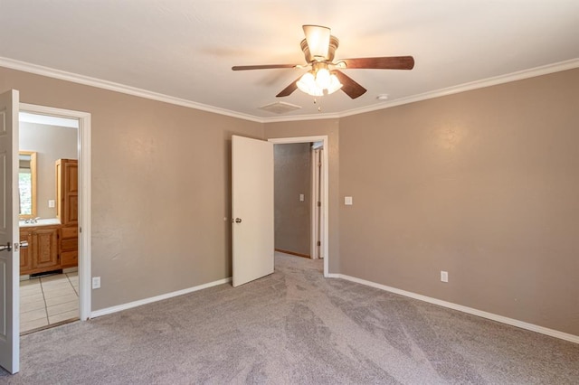 unfurnished bedroom with connected bathroom, ceiling fan, light carpet, and ornamental molding