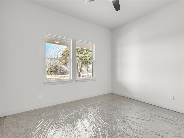 unfurnished room featuring ceiling fan