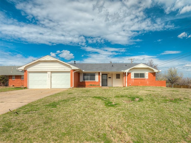 ranch-style home with a garage and a front lawn