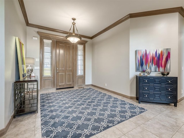 foyer entrance featuring tile patterned floors and ornamental molding