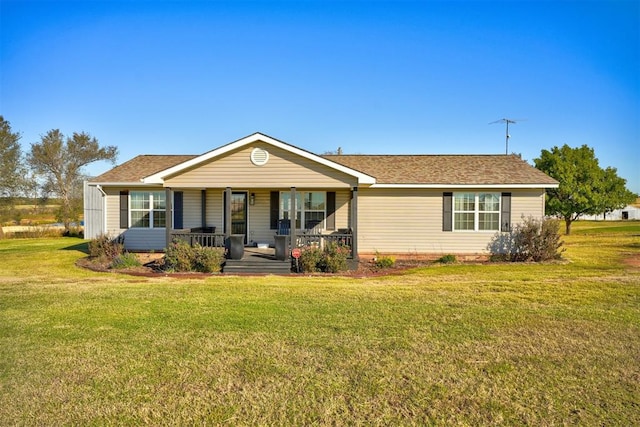 ranch-style house with a front lawn and a porch